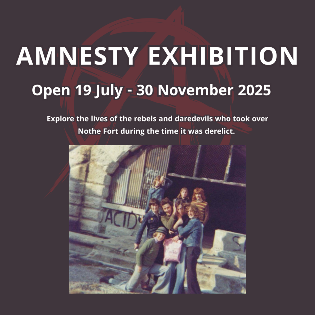A dark black background with an image in the centre of An old photo of a group of young rebels pose together for a photo in front of a graffiti covered arched window in the Fort. The text reads AMNESTY EXHIBITION open 19 July - 30 November 2025. Explore the lives of the rebels and daredevils who took over Nothe Fort during the time it was derelict.