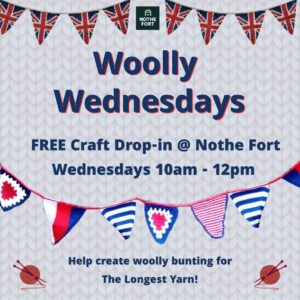 Square promotional graphic for “Woolly Wednesdays” at Nothe Fort. The background resembles knitted fabric with red, white, and blue wool bunting across the top and bottom. Text reads: “Woolly Wednesdays. FREE Craft Drop‑in @ Nothe Fort. Wednesdays 10am–12pm. Help create woolly bunting for The Longest Yarn!” A small Nothe Fort logo appears at the top, with illustrated balls of wool and knitting needles in the bottom corners.